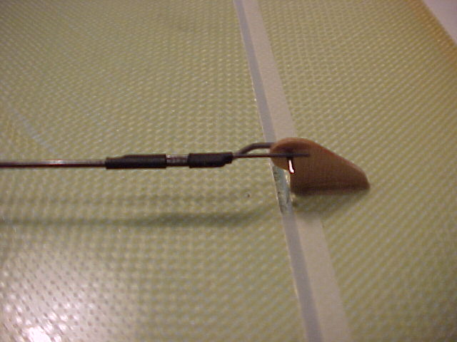 A close-up of the aileron horn and linkage