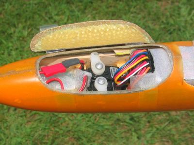 Fuselage pod showing servo installation and radio gear.