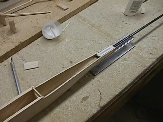 Final boom lock-down with epoxy