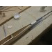 Final boom lock-down with epoxy